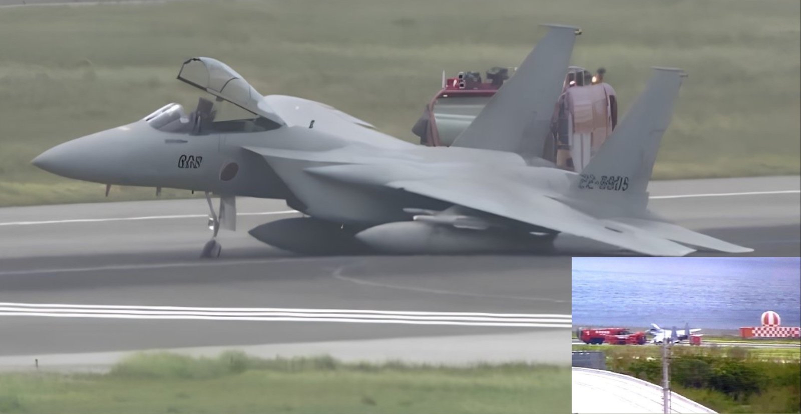 Japan Air Self-Defense Force F-15 Fighter Jet Skids on Runway at Naha Airport After Landing Gear Failure